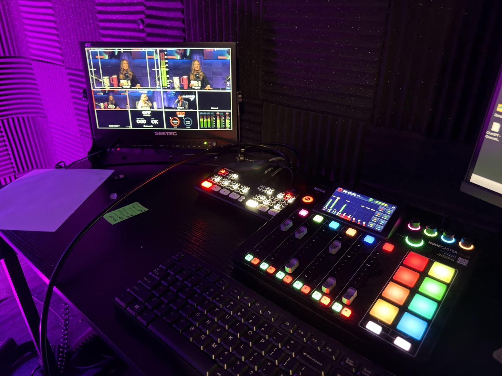 Audio mixer with lit pads and a program monitor at studioUSA East in Plano