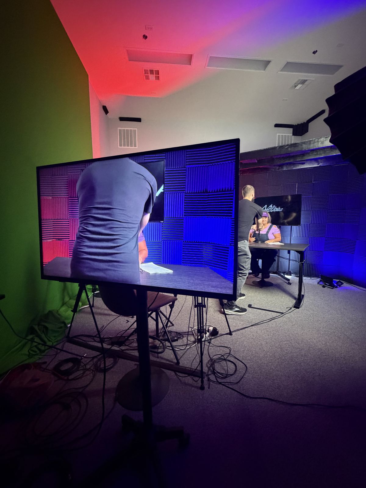 Program monitor showing a speaker on camera at studioUSA West